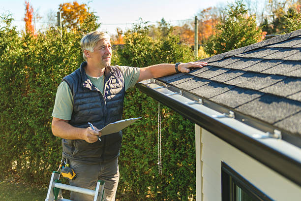 Professional Hail Damage Roof Repair technician working in Sun Valley, ID